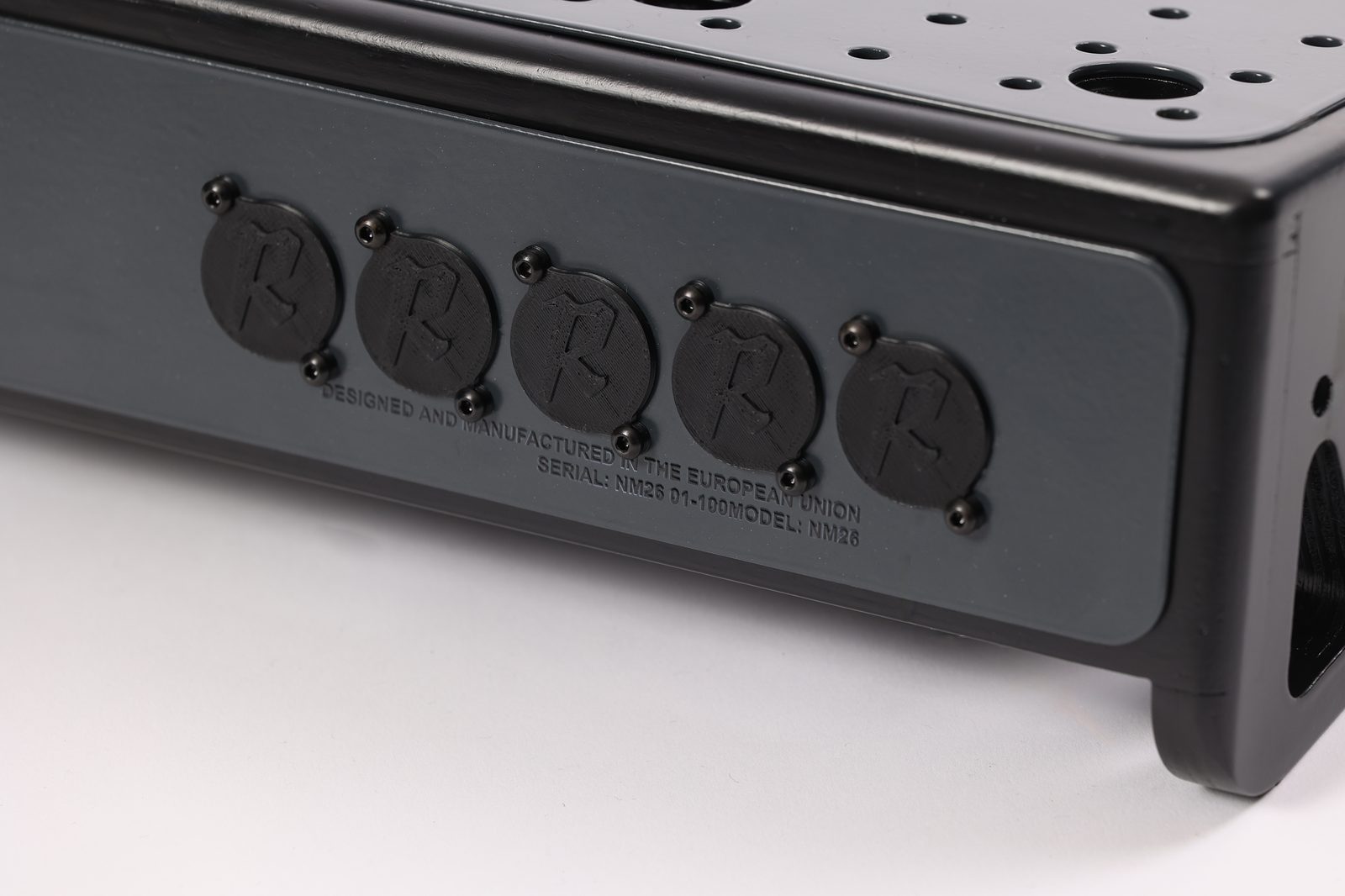 Nebula pedalboard perforated surface with panel-mount chassis connector cutouts