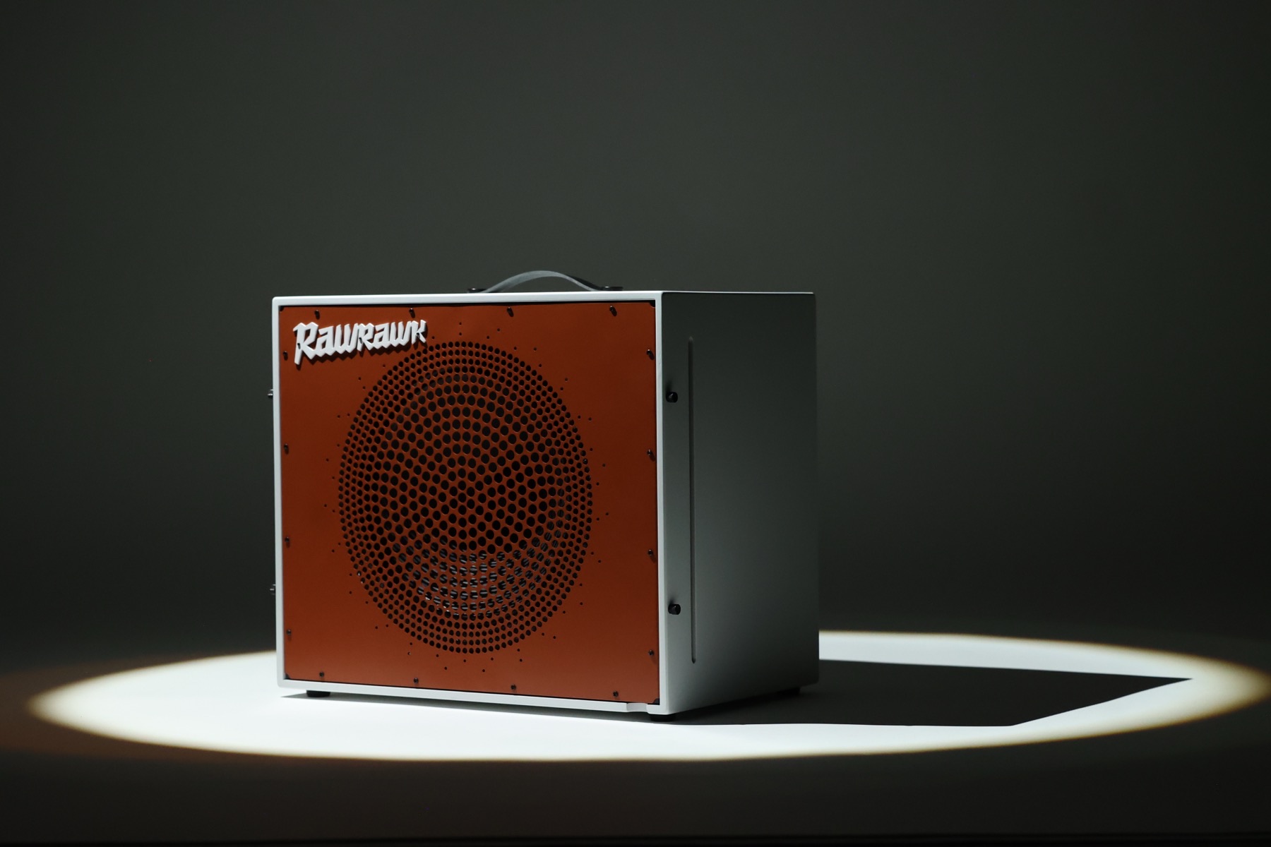 Rawrawk Quasar 1×12 with Corten Airframe under studio spotlight